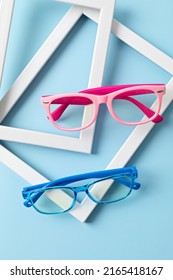 Child Eyeglasses Over Pastel  Background. Optical Store, Glasses Selection For Kids, Eye Test, Vision Examination At Optician Concept. Top View, Flat Lay