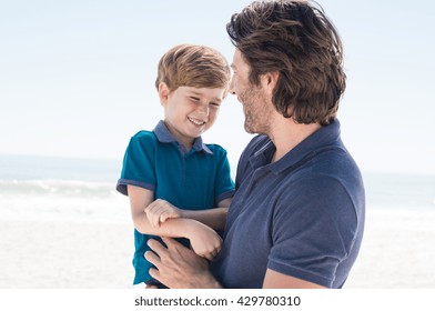 Child In Father Arms. Father Day Out With Son. Father Spending Quality Time With Son.  
