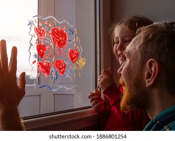 Child and father painting
