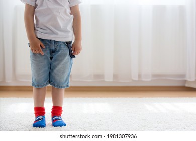 Child Feet With Different Socks Standing In Rows, Kids Wearing Different Colorful Socks