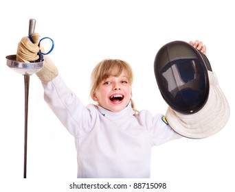 Child in fencing costume holding epee. Isolated.