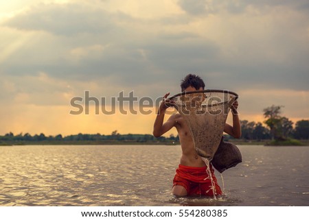 Child fishing in the lake