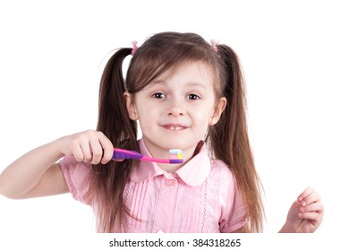 child girl brushing teeth isolated on white background