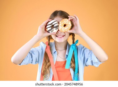 Child Girl With Donut Eyes Happy Smiling Face. Kid Have Fun,entertainment. Good Mood Concept. Person With Sweet Food.caucasian Teen Portrait.