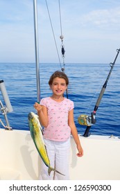 Child Girl Fishing In Boat With Mahi Mahi Dorado Fish Catch With Rod And Trolling Reels