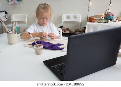 Child Girl Molding In Pottery Online Class By Video Lesson By Ceramic Art Studio. Video Master Class On Creating Ceramic Products. 