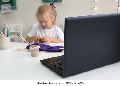 Child Girl Molding In Pottery Online Class By Video Lesson By Ceramic Art Studio. Video Master Class On Creating Ceramic Products. 