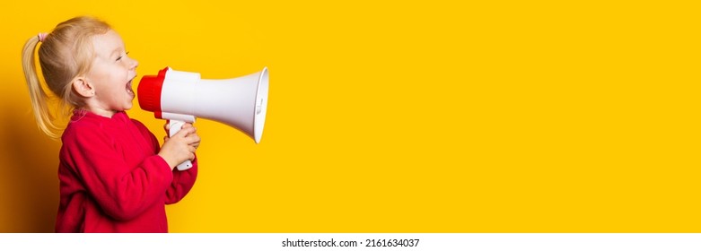 child girl shouts into a white megaphone on a bright yellow background. Banner.