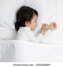 Child Girl Sleeping On The Wooden Bed In Her Bedroom, Baby Healthy And Preschool Concept