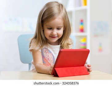 Child Girl Tablet Computer Table Home Stock Photo 324358376 | Shutterstock