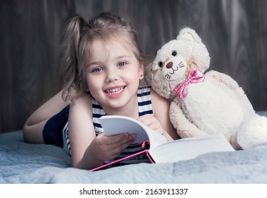 Child Girl Toy Reading Book Happy Stock Photo 2163911337 | Shutterstock