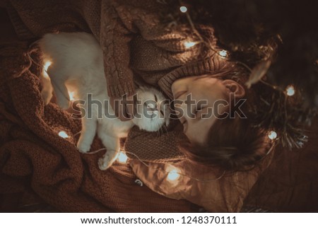 Similar – Newborn baby with pompom hat sleeping on blanket