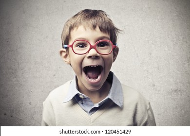Child with glasses shouting
