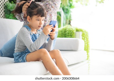 Child Going Back To School. Mother And Kid Getting Ready For First School Day After Vacation. Little Girl And Mom Going To Kindergarten Or Preschool. Student Packing Booksand Lunch In Backpack.