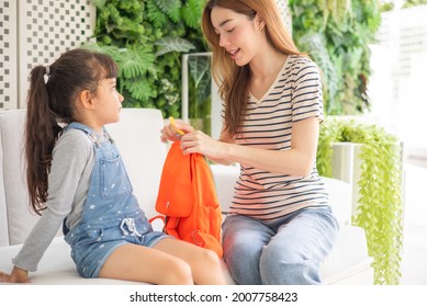 Child Going Back To School. Mother And Kid Getting Ready For First School Day After Vacation. Little Girl And Mom Going To Kindergarten Or Preschool. Student Packing Booksand Lunch In Backpack.