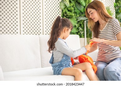 Child Going Back To School. Mother And Kid Getting Ready For First School Day After Vacation. Little Girl And Mom Going To Kindergarten Or Preschool. Student Packing Booksand Lunch In Backpack.