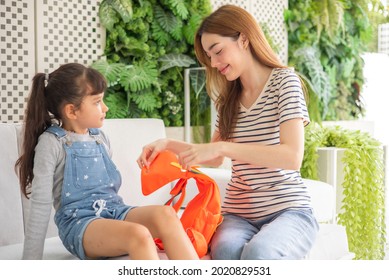 Child Going Back To School. Mother And Kid Getting Ready For First School Day After Vacation. Little Girl And Mom Going To Kindergarten Or Preschool. Student Packing Booksand Lunch In Backpack.