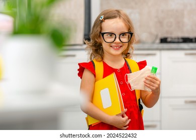 Child Going Back To School. Mother And Kid Getting Ready For First School Day After Vacation. Little Girl And Mom Going To Kindergarten Or Preschool. Student Holding Books, Her Hands