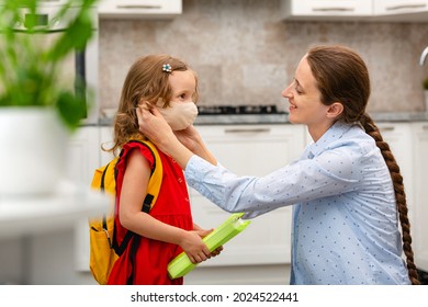 Child Going Back To School. Mother And Kid Getting Ready For First School Day After Vacation. Little Girl And Mom Going To Kindergarten Or Preschool. Student Holding Books, Her Hands