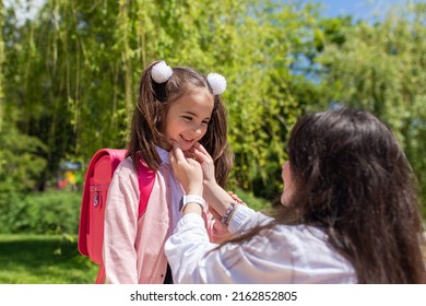 Child Going Back To School. Mother And Kid Getting Ready For First School Day After Vacation.