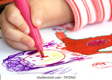 Child hand drawing - Shutterstock ID 7472962