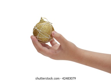 Child Hand Holding Golden Christmas Ball Isolated On White