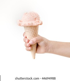 Child Hand Holding A Strawberry Ice Cream Scoop On Cones