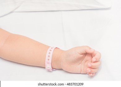 Child Hand With Patient Id Bracelet.