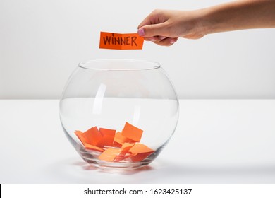 Child Hand Picking Winner From A Glass Bowl, Random Name Ballot, Simple Raffle