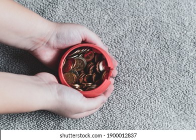  Child Hands Holding Money Jar. Donation,saving,charity ,family Finance Plan Concept.Superannuation