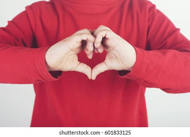 Child Hands Showing Sign Of Heart