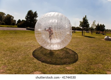 child has a lot of fun in the Zorbing Ball