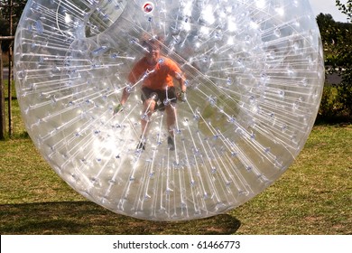 child has a lot of fun in the Zorbing Ball
