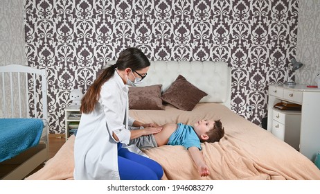 The Child Has A Stomach Ache, The Doctor Checks . High Quality Photo