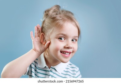 Child Hear. Hearing Loss, Symptoms And Treatment Concept. Caucasian Kid Portrait.Gossip And News.