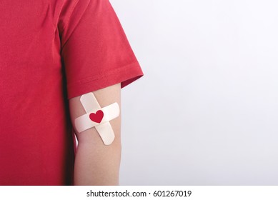 Child With A Heart Drawn On His Arm. Blood Donation Concept