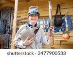 child in historical costume of a South American Confederate soldier