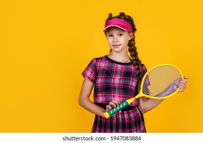 Child Hold Badminton Racket. Kid Tennis Player. Back To School. Happy And Healthy Childhood