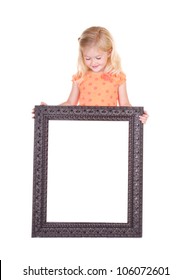 Child Holding Blank Frame Looking Down, Isolated On White