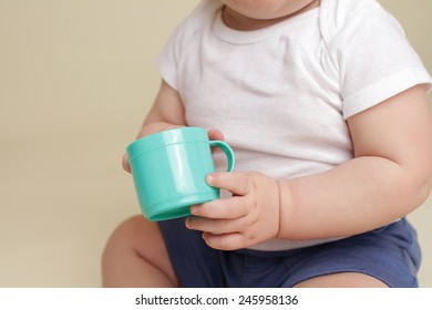 Child Holding A Cup, Eating Or Drinking, Baby Nutrition Concept