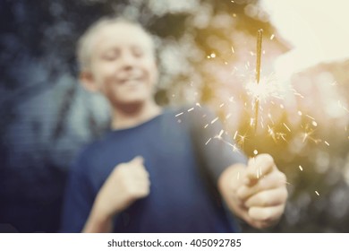 Child Holding A Sparkler,  Instagram Toned Image