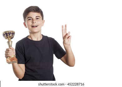 Child Holding A Trophy