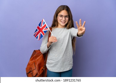 Child Holding An United Kingdom Flag Over Isolated Background Happy And Counting Three With Fingers