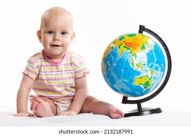 The Child Holds The Planet Earth In His Hands. War In Ukraine. Russia Terrorist. Stop War. Toy Globe In Children's Hands. Peace On Earth Concept