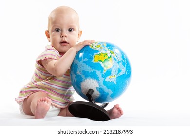 The Child Holds The Planet Earth In His Hands. War In Ukraine. Russia Terrorist. Stop War. Toy Globe In Children's Hands. Peace On Earth Concept