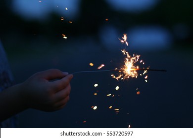 Child Holds Sparkler