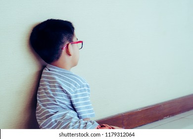 Child Homeless Sitting In The Building For Waiting Someone Help For Food With Lyrics.