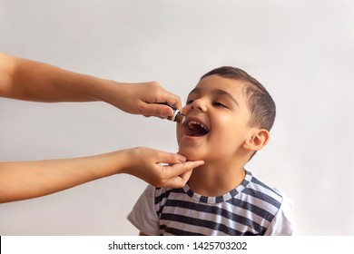 Child Immunization With Little Drop In Clinic. Doctor Providing Immunization Vaccines For The Immune System Of Infant. Child's Immunization, Children's Vaccination, Health Conception.