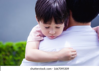 Child Infect Virus Of Flu, Sick At School. His Father Pick Up His Poor Child Go To Hospital Or Go Back Home. Dad Carry Son. Boy Sleeping On Fathers Shoulder. Lovely Children Get Tired And Feel Sleepy