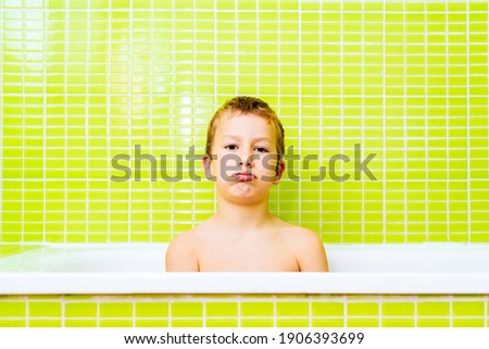 Similar – Image, Stock Photo Blonde boy does a roll under blue water in swimming pool